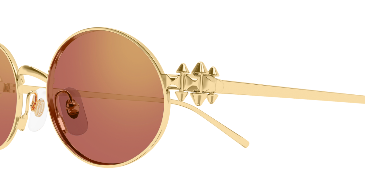 cartier ct0644s 003 ovale sonnenbrille in gold mit roten gläsern