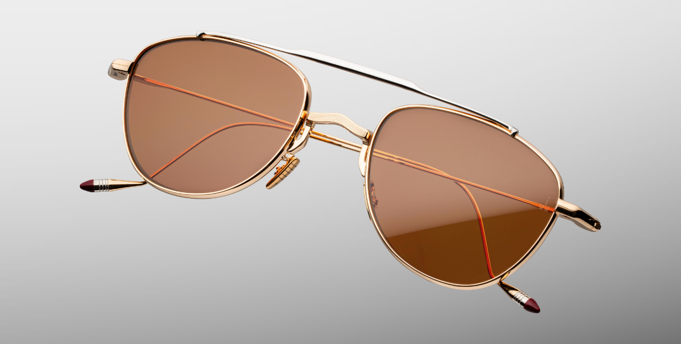 jacques marie mage flynn darjeeling aviator sonnenbrille aus titan in gold mit orangenen gläsern
