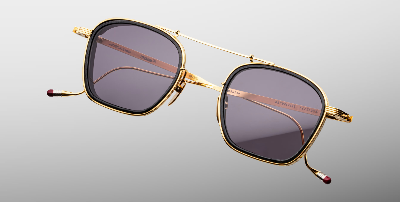 jacques marie mage baudelaire 2 ebony eckige sonnenbrille aus titan und acetat in gold und schwarz marmoriert mit grau blauen gläsern