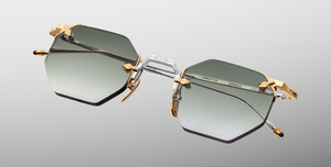 jacques marie mage eldorado electrum achteckige randlose sonnenbrille in silber und gold mit blauen gläsern