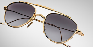 jacques marie mage flynn cia aviator sonnenbrille aus titan in gold mit grauen verlaufsgläsern