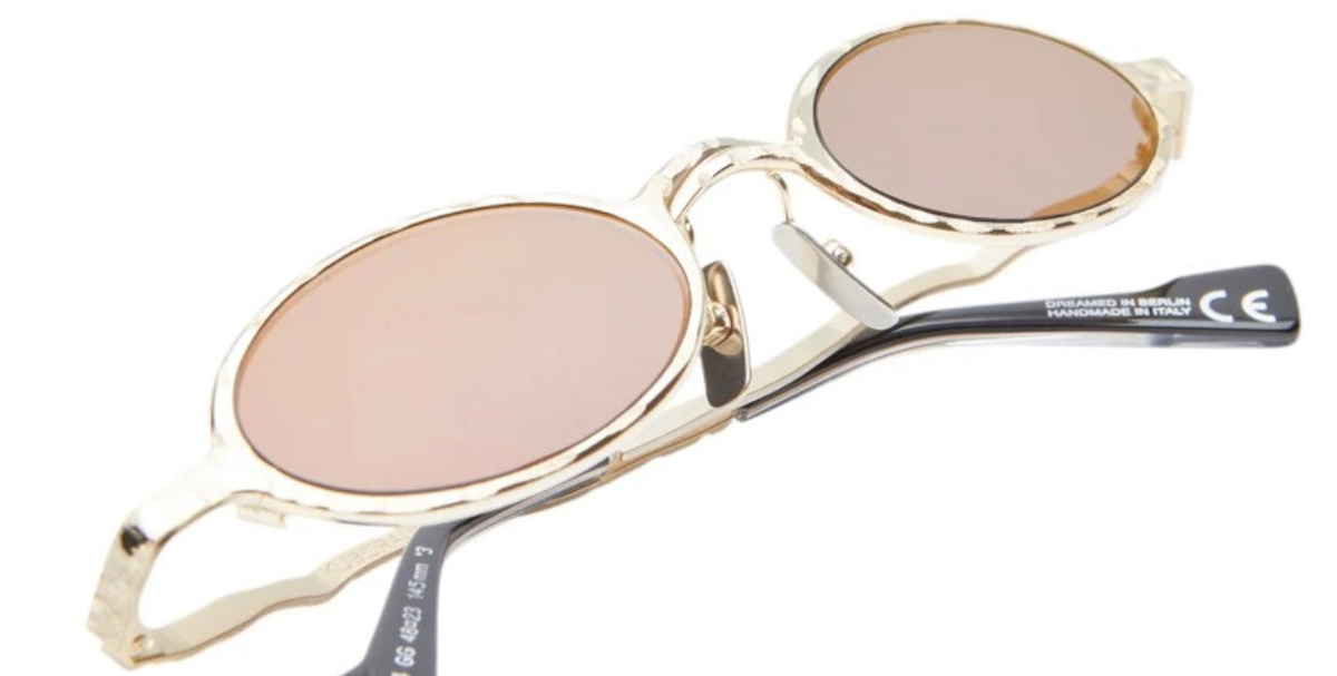 kuboraum Z24 GG ovale sonnenbrille aus metall in gold mit grauen und gold verspiegelten gläsern