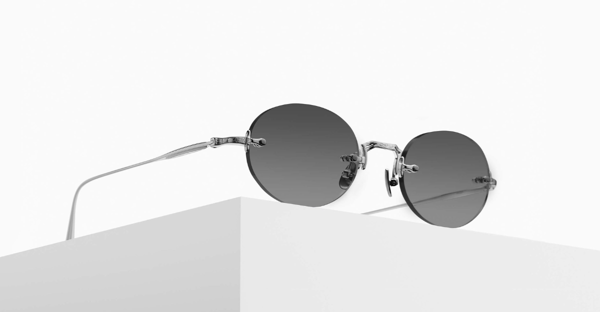 matsuda m5002 palladium white ovale randlose sonnenbrille in silber mit grauen gläsern