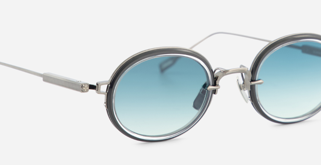 sato acamar II as/BB-1 ovale sonnenbrille aus titan in silber und schwarz mit blauen verlaufsgläsern