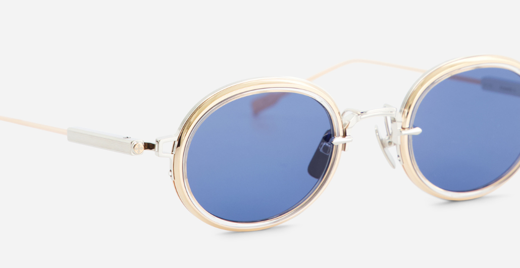 Sato Acamar II P/RG-1 ovale sonnenbrille aus titan n platinum und rose gold mit blauen gläsern