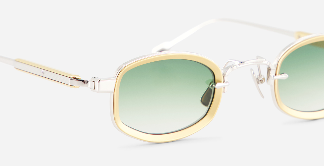 sato aquila p/yg-1 eckige sonnenbrille aus titan in platinum und gelbgold mit grünen verlaufsgläsern