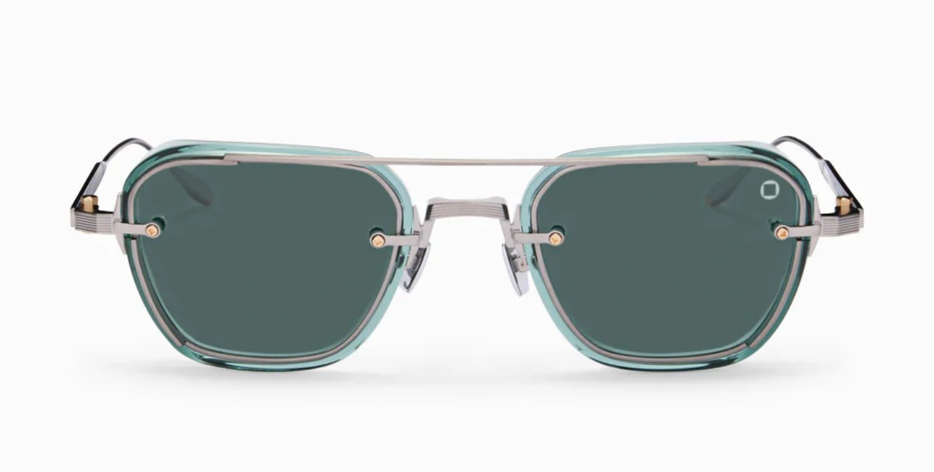 akoni jura deep emerald green eckige sonnenbrille in silber und grün mit grünen gkäsern