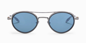 akoni astria crystal grey ovale sonnenbrille aus titan und acetat in silber und grau mit blauen verspiegelten gläsern