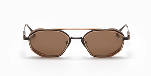 akoni eris-two brushed black ovale sonnenbrille in matt schwarz und golg mit braunen gläsern