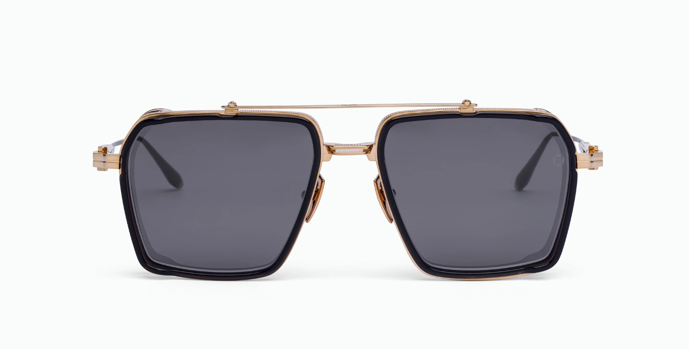 akoni tiros brushed gold eckige sonnenbrille in gold und schwarz mit grauen gläsern