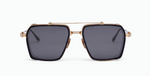 akoni tiros brushed gold eckige sonnenbrille in gold und schwarz mit grauen gläsern