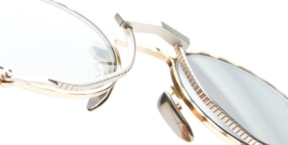 kuboraum Z70 GSB ovale sonnenbrille in gold, silber und schwarz mit grauen verpsiegelten gläsern