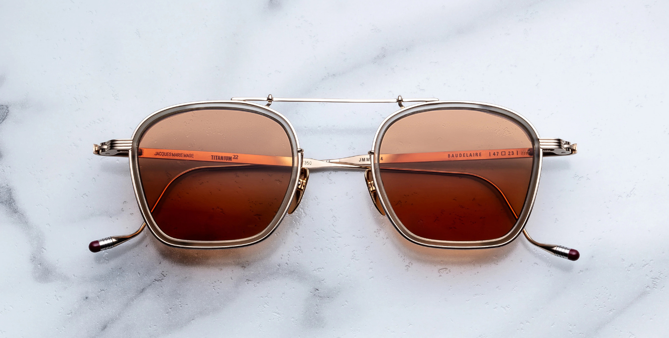 jacques marie mage baudelaire 2 darjeeling eckige sonnenbrille aus titan und acetat in gold und taupe mit orangenen gläsern