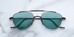 jacques marie mage flynn paon aviator sonnenbrille aus titan in schwarz mit türkisen gläsern
