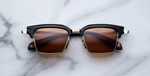 jacques marie mage alin noirx eckige sonnenbrille in silber , gold und schwarz mit braunen gläsern