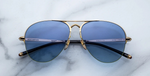 jacques marie mage amelia gold, pilotensonnenbrille in gold mit blauen verlaufsgläsern