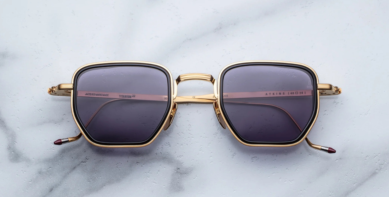jacques marie mage atkins gold eckige sonnenbrille in gold und schwarz mit violetten gläsern