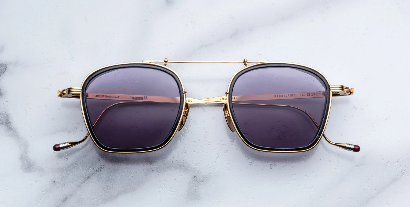 jacques marie mage baudelaire 2 ebony eckige sonnenbrille aus titan und acetat in gold und schwarz marmoriert mit grau blauen gläsern