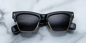 jacques marie mage bugsy ecplise2 cateye sonnenbrille in schwarz und gold mit dunkel grauen verlaufsgläsern