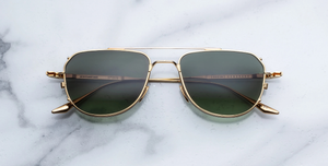 jacques marie mage cendrars musket aviator sonnenbrille in gold und silber mit grün verlaufenden gläser