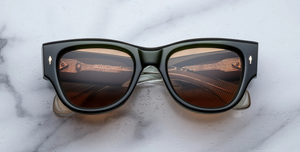 jacques marie mage chelsea borneo eckige sonnenbrille in grün mit orangenen gläsern