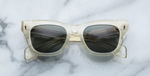 jacques marie mage dealan brut eckige sonnenbrille in transparent mit grünen gläsern