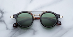 jacques marie mage delage etna runde sonnenbrille in havana und gold mit grünen gläsern