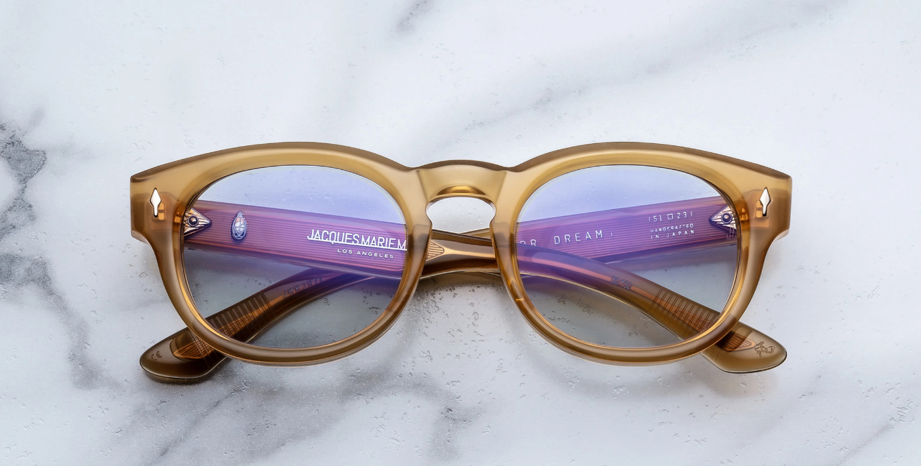 jacques marie mage dr.dream marigold ovale sonnenbrille in transparentem orange mit hellblauen gläsern