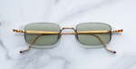 jacques marie mage dusk electrum eckige sonnenbrille aus titan in gold und silber mit grünen gläsern