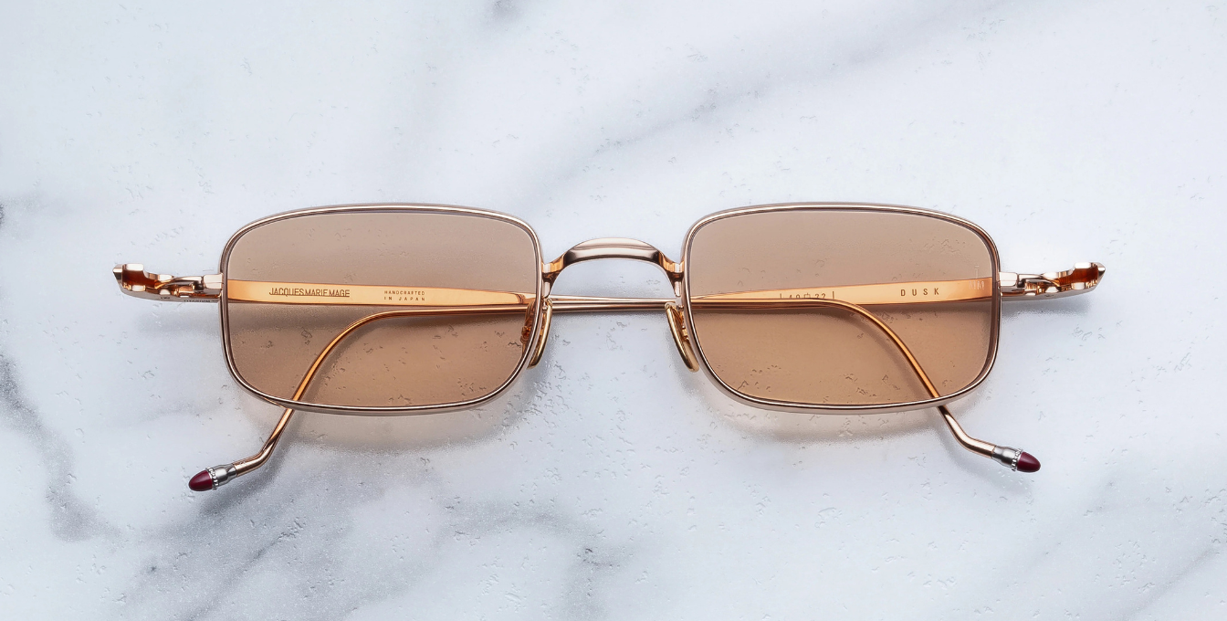 jacques marie mage dusk sweetheart eckige sonnenbrille aus titan in rosegold mit orangenen gläsern