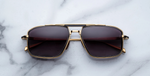 jacques marie mage earl cia eckige sonnenbrille in gold und schwarz mit schwarzen gläsern
