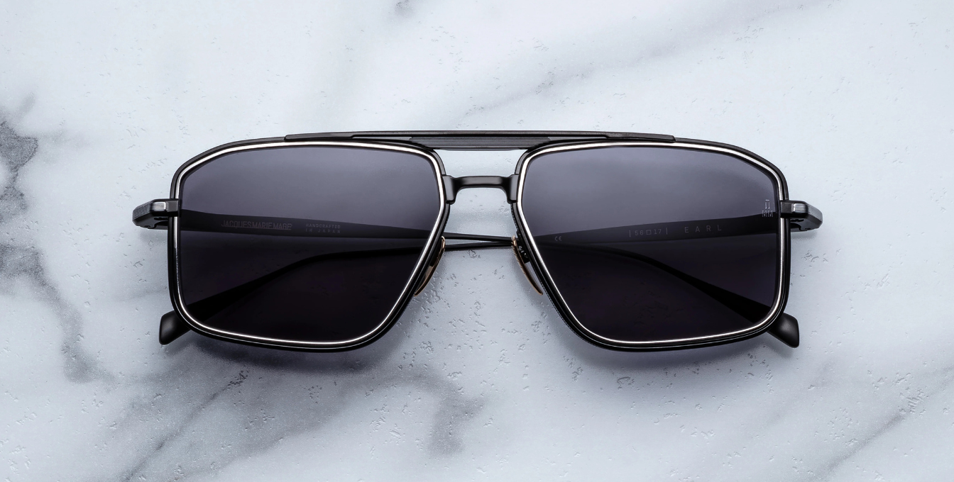 jacques marie mage earl corbeau eckige sonnenbrille in schwarz und silber mit grauen gläsern