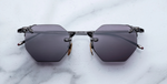 jacques marie mage eldorado black achteckige randlose sonnenbrille in schwarz mit grauen gläsern