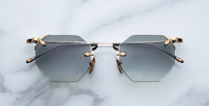 jacques marie mage eldorado electrum achteckige randlose sonnenbrille in silber und gold mit blauen gläsern