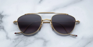 jacques marie mage flynn cia aviator sonnenbrille aus titan in gold mit grauen verlaufsgläsern