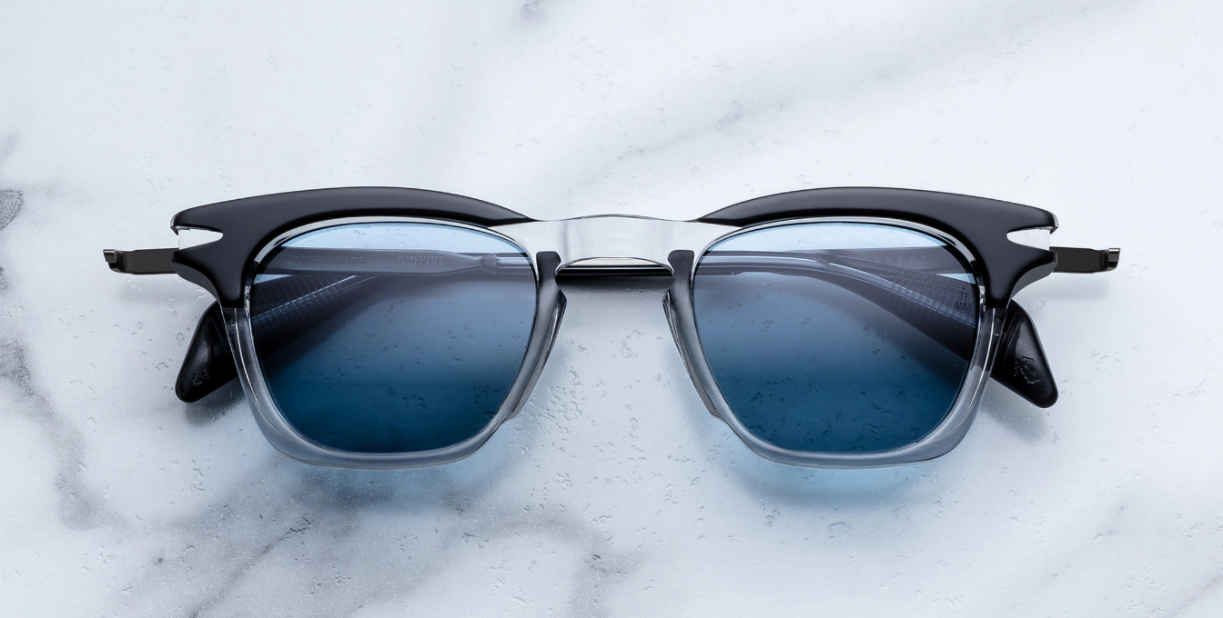jacques marie mage kennedy sulfur eckige sonnenbrille in transparent und grau mit blauen gläsern