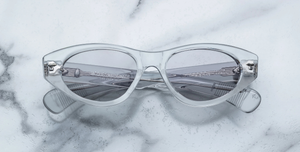 jacques marie mage krasner sulfur ovale sonnenbrille in transparent mit grauen gläsern