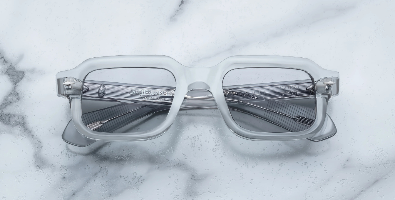 jacques marie mage sandro sulfur eckige sonnenbrille in transparent mit grauen gläsern