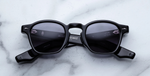 jacques marie mage zephirin raven eckige sonnenbrille in schwarz mit grauen gläsern