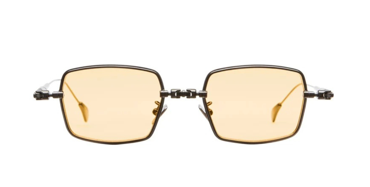 kuboraum h69 rh eckige titansonnenbrille in gunmetal mit hell orangenen gläsern