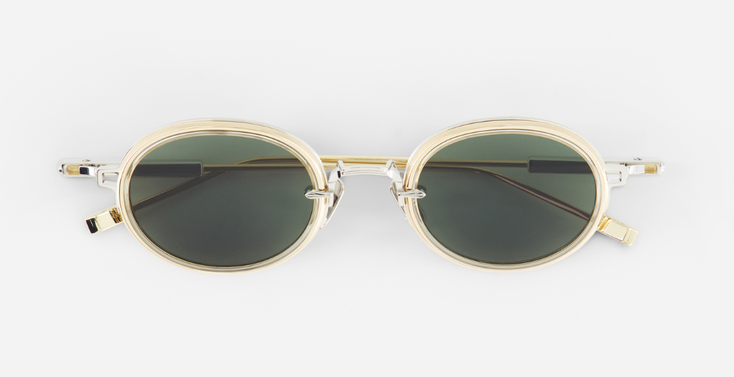 sato Acamar II | P/LG-1 ovale sonnenbrille aus titan in platinum um gold mit grau grünen gläsern