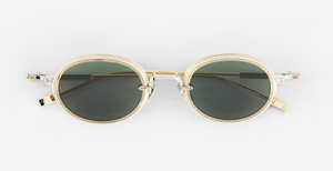sato Acamar II | P/LG-1 ovale sonnenbrille aus titan in platinum um gold mit grau grünen gläsern