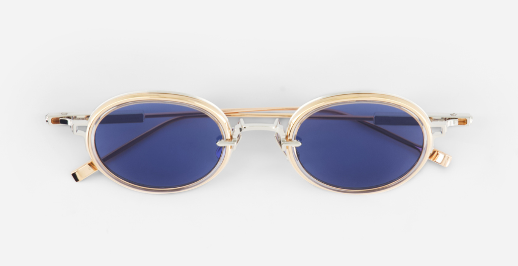 Sato Acamar II P/RG-1 ovale sonnenbrille aus titan n platinum und rose gold mit blauen gläsern