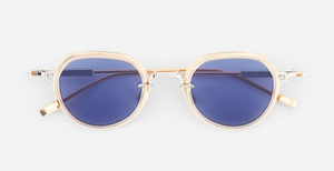 sato Belell II P/RG-1 panfoförmige sonnenbrille aus titan in silbe rund gold mit blauen gläsern