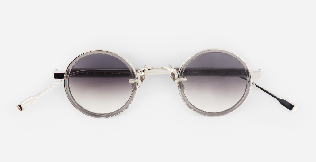 sato naos P/GC-1 ovale sonnenbrille aus titan und acetat in silber und grau mit grauen verlaufsgläsern
