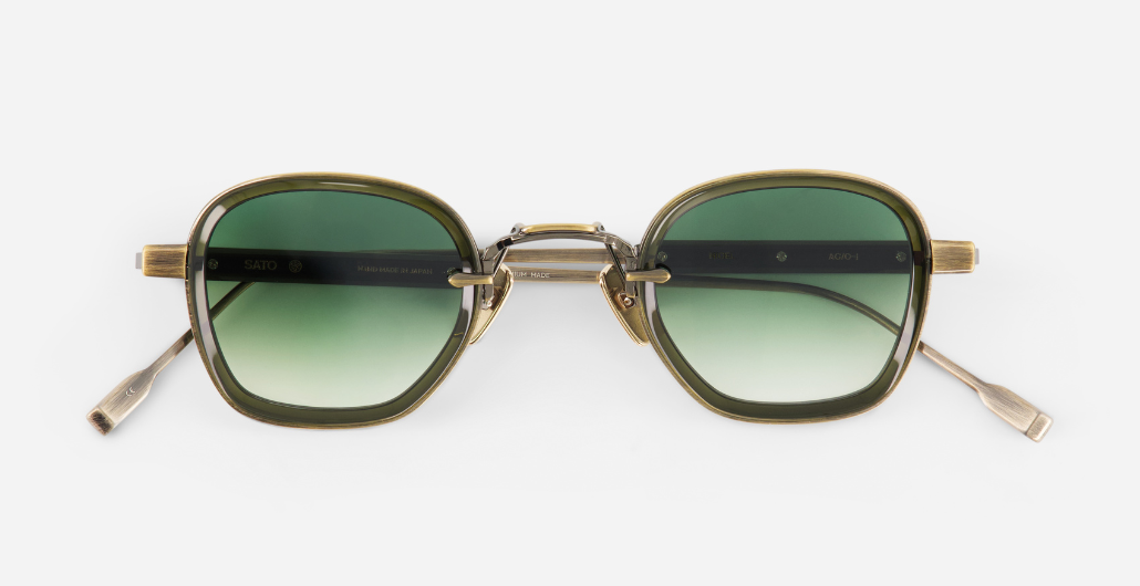 sato rigel ag/o-1 eckige sonnenbrille aus titan und acetat in gold und olive mit grünen verlaufsgläsern