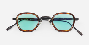 sato rigel b/t-1 eckige sonnenbrille aus titan und acetat in matt schwarz und havana mit hellblauen gläsern und einer leichten verspiegelung