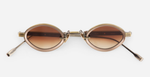 sato talita ag/mb-1 ovale sonnenbrille aus titan in gold und braun mit braunen verlaufsgläsern