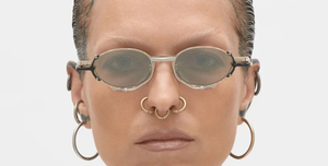 kuboraum Z70 GSB ovale sonnenbrille in gold, silber und schwarz mit grauen verpsiegelten gläsern