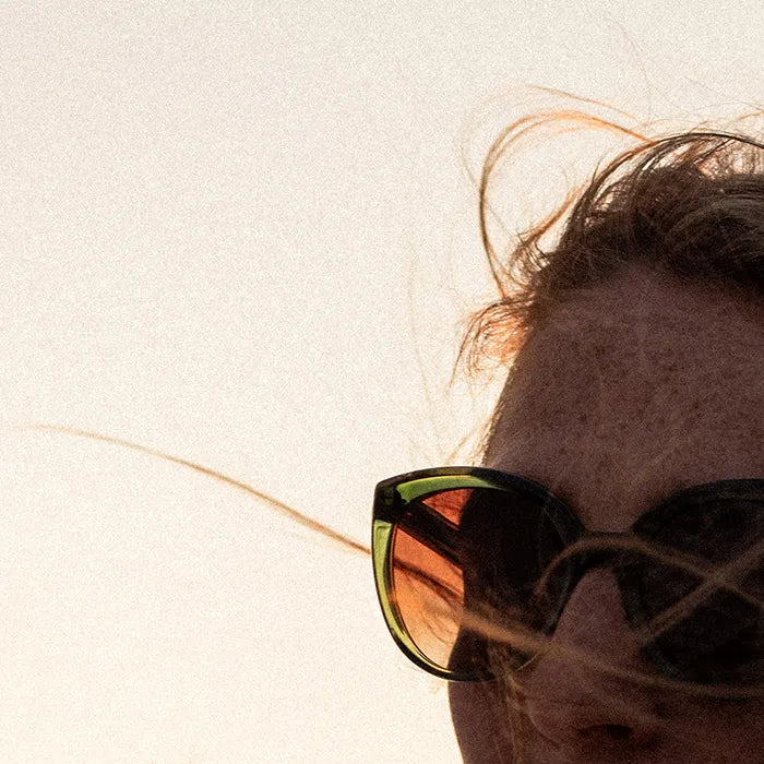 female model wearing hug sunglasses